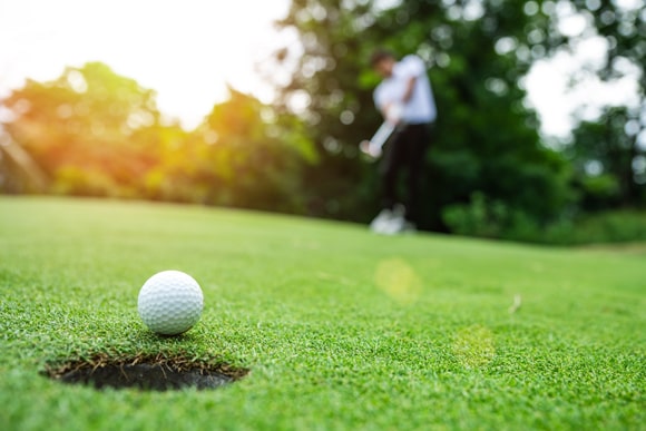 Man Playing Golf